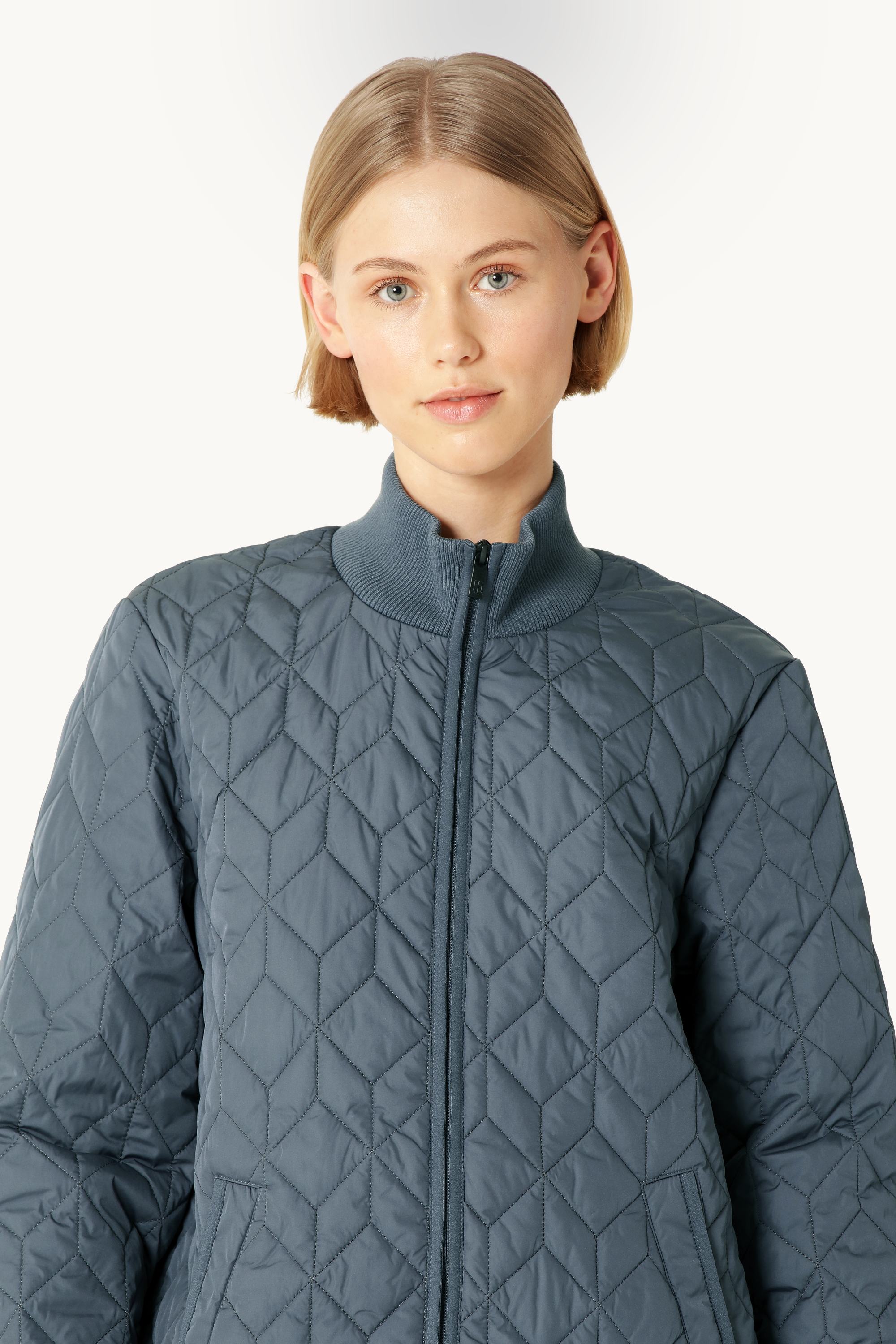 Langer Steppmantel - Ombre Blue
